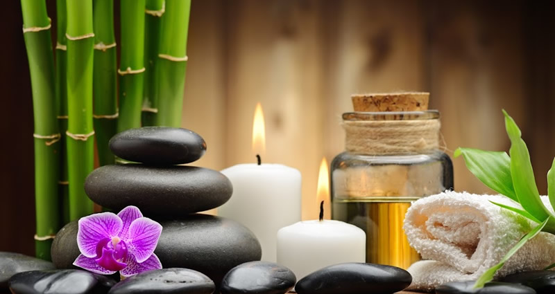 Therapeutic massage stones oil and bamboo